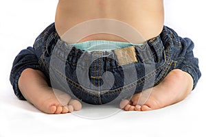 A Toddlers Feet and Bottom on a White Background