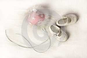 A Toddlers Pink Party Hat and Shoes