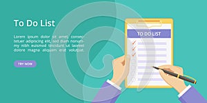 Todo list hands on clipboard green landing page photo