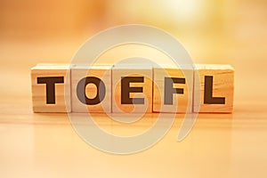 TOEFL, text words typography written on wooden lettering, english languange educational