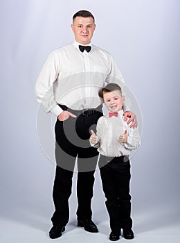 Toffs father and son in formal suit. small boy with dad businessman. family day. male fashion. parenting. fathers day