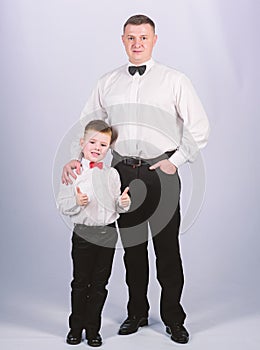 Toffs father and son in formal suit. small boy with dad businessman. family day. male fashion. parenting. fathers day