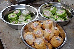 Tofu and bitter gourd filled with chopped pork, a traditional chinese dish.