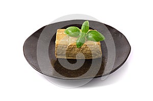 Tofu Cheese Isolated, Smoked Vegan Cheese Slice, Sliced Soya Bean Curd, Soy Protein or TSP photo