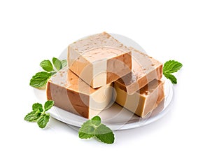 Tofu Cheese Isolated, Smoked Vegan Cheese Slice, Sliced Soya Bean Curd, Soy Protein or TSP photo