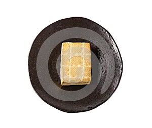 Tofu Cheese Isolated, Smoked Vegan Cheese Slice, Sliced Soya Bean Curd, Soy Protein or TSP photo