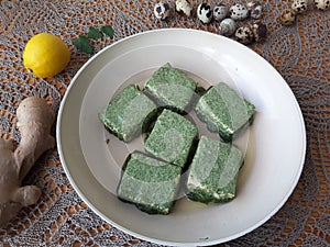 Tofu in green nettles tempura, cooking vegetarian food