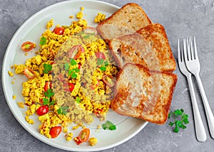 Tofu Scramble with Toasted bread, Vegan Food, Vegan Breakfast, Dark Background, Healthy Food Photography