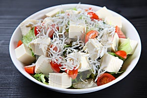 Tofu and whitebait salad bowl