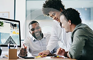 Together we can be more productive. a group of young businesspeople having a discussion in an office.