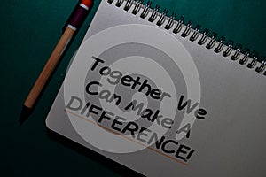 Together We Can Make A Difference! write on a Book isolated on Office Desk