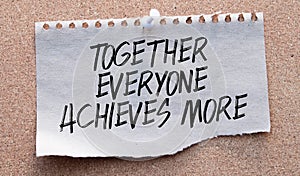 Together everyone achieves more phrase written with a typewriter