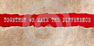 Together We Make A Difference appearing behind torn paper. Business photo