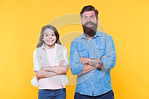 Together we make family. Happy family yellow bacckground. Father and daughter. Bearded man and child. Adoptive family