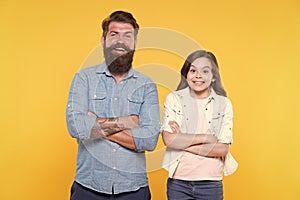 Together we make family. Happy family yellow bacckground. Father and daughter. Bearded man and child. Adoptive family