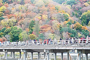 Togetsukyo bridge with colorful leaves mountains and Katsura river in Arashiyama, landmark and popular for tourists attractions in