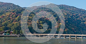 Togetsukyo bridge and Hozu river in autumn season.