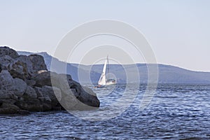 Yachting. A small yacht under sail on the reservoir