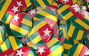 Togo Badges Background - Pile of Togo Flag Buttons.