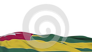 Togo fabric flag waving on the wind loop. Togo embroidery stiched cloth banner swaying on the breeze. Half-filled white background