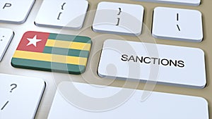 Togo Imposes Sanctions Against Some Country. Sanctions Imposed on Togo. Keyboard Button Push. Politics Illustration 3D