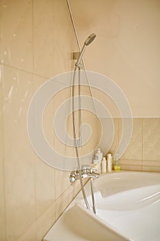 Toilet and bathroom with rain shower head.luxury hotel room. selective focus.