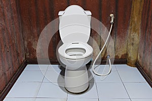 The Toilet bowl with bidet shower in toilet
