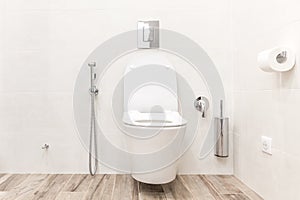 Toilet bowl in modern white style bathroom