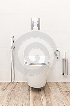Toilet bowl in modern white style bathroom