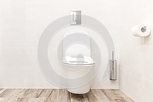 Toilet bowl in modern white style bathroom