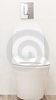 Toilet bowl in modern white style bathroom