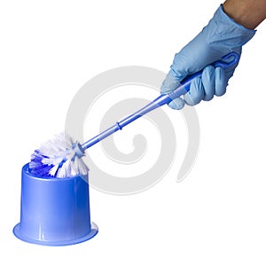 Toilet brush in hand with blue glove, isolated. Cleaning