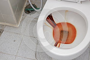 Toilet dirty , Rusty water in public toilet bowl