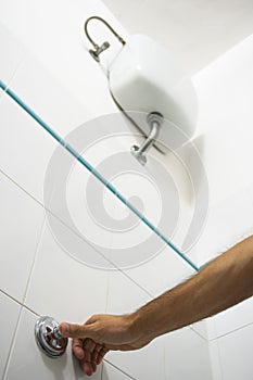 Toilet flush button with hand