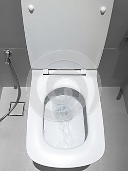 Toilet, Flushing Water, flush toilet, white toilet, Close-up the toilet