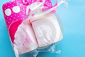 Toilet paper in cellophane packaging