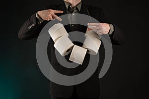 Toilet paper Memes. Business man wearing necklace made of toilet paper point, gangster gesture