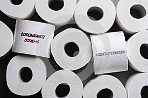 Toilet paper with message COVID-19 and Spanish message for #STAYATHOME