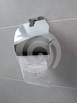 Toilet paper roll and holder