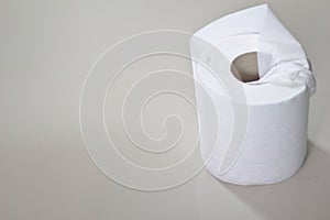 Toilet paper rolls white background gray background blank desk