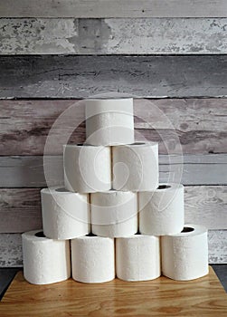 Toilet paper stacked on table