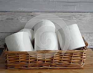 Toilet rolls in a basket