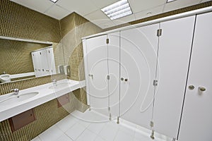 Toilet room in modern busines center photo