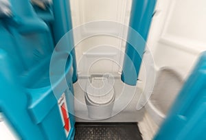 Toilet seat of a modern and well-kept toilet cubicle