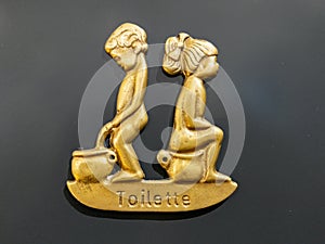 Toilet Sign With Boy And Girl