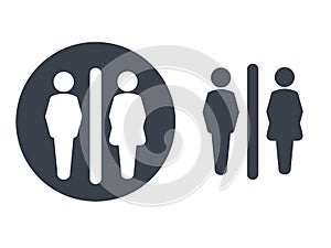 Toilet symbols on white background. White silhouettes in a dark grey circle and dark grey male and female icon on white backgroun