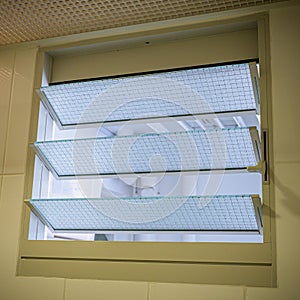 Toilet ventilation window in HDB BTO apartment.