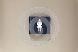 Toilet, wc icon, square white and dark blue sign on restroom door