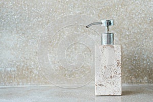 Toiletries bottles in bathroom at luxury hotel or modern home. body shower gel in ceramic ware with wall background