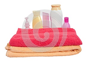 Toiletries with pink towel